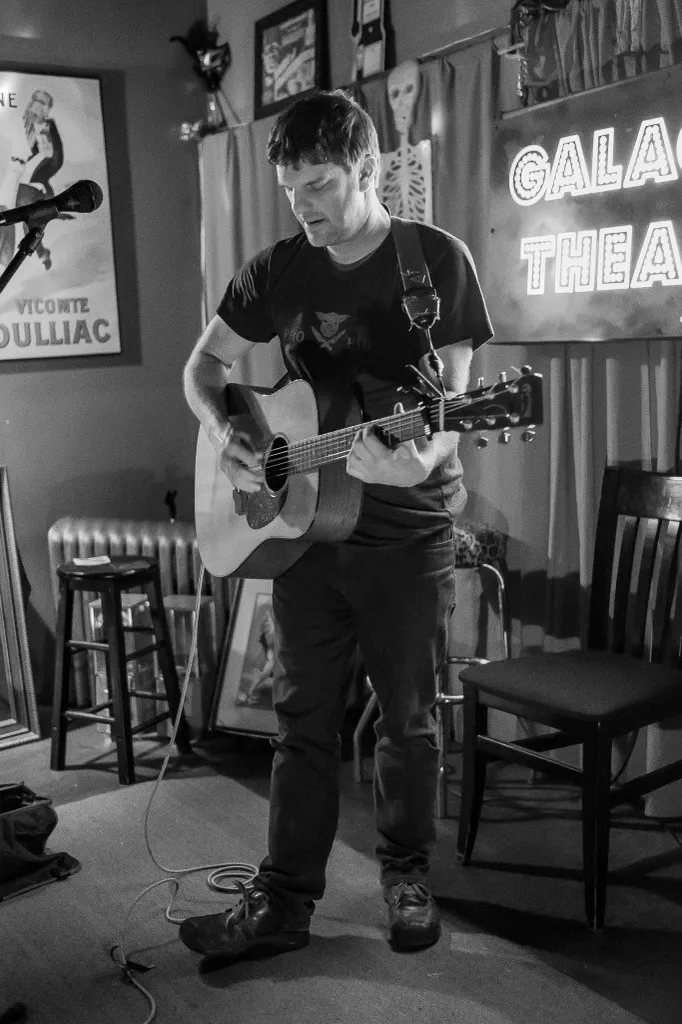 Anthony Loffredio playing guitar